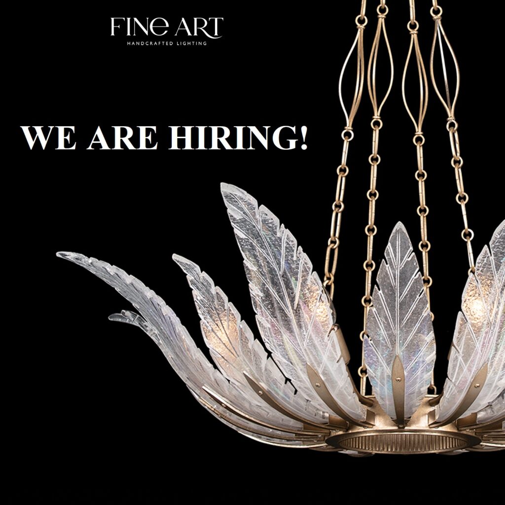 "we are hiring"in white text over a black background with a chandelier